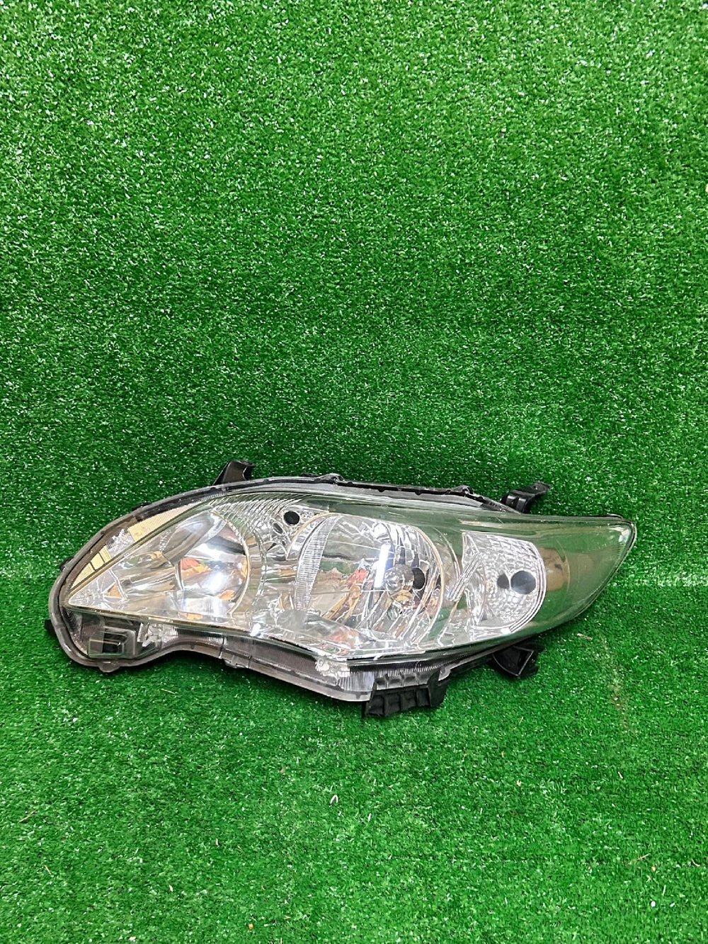 REFLEKTOR PRAWY TOYOTA COROLLA E14