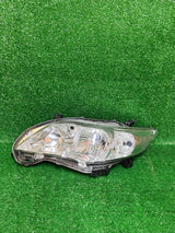 REFLEKTOR PRAWY TOYOTA COROLLA E14