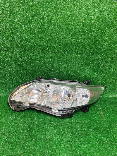 REFLEKTOR PRAWY TOYOTA COROLLA E14