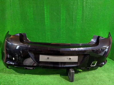 ZDERZAK TYLNY TYŁ OPEL ASTRA J SEDAN IV BEZ PDC