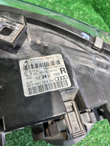 REFLEKTOR PRAWY AUDI A4 B7