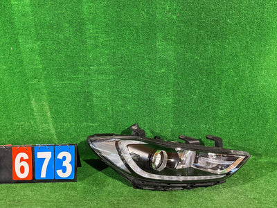 REFLEKTOR PRAWY HYUNDAI ELANTRA VI XENON NR:673
