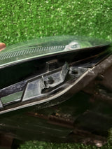 REFLEKTOR LEWY VW TIGUAN I LIFT nr:148