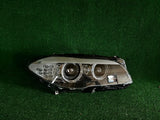 REFLEKTOR PRAWY BMW F10 XENON