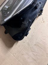 REFLEKTOR LEWY VW TIGUAN II LIFT NR.010