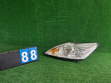 REFLEKTOR LEWY FORD FOCUS MK2 LIFT nr:88