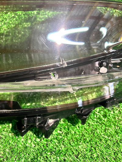 KLOSZ REFLEKTORA LEWY LEXUS LS 18-