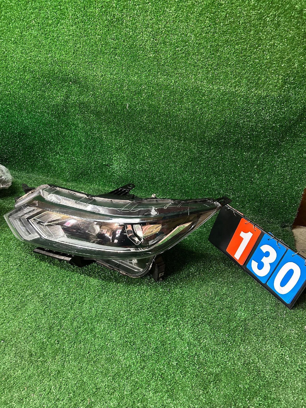 REFLEKTOR LEWY NISSAN QASHQAI II LIFT nr:130