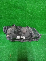 REFLEKTOR LEWY VW TOURAN 1T LIFT 2010-2015R