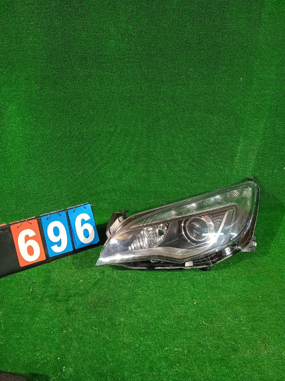 REFLEKTOR LEWY PRZÓD OPEL ASTRA IV J BI XENON LED NR.696