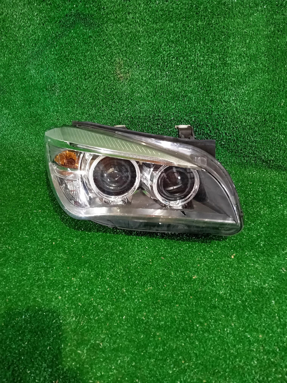 REFLEKTOR PRAWY XENON BMW X1 E84 LIFT NIESKRĘTNY