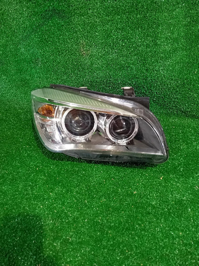 REFLEKTOR PRAWY XENON BMW X1 E84 LIFT NIESKRĘTNY