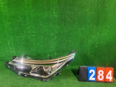 REFLEKTOR LEWY TOYOTA COROLLA E16 LIFT E18 nr:284