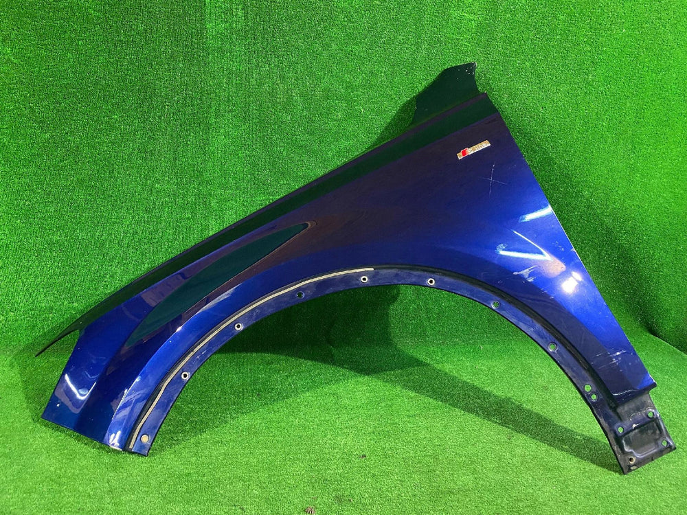 BŁOTNIK PRZEDNI LEWY AUDI Q7 4M0