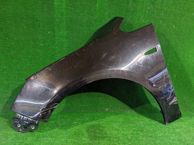 BŁOTNIK PRZEDNI LEWY PRZÓD OPEL ASTRA J IV NR.055
