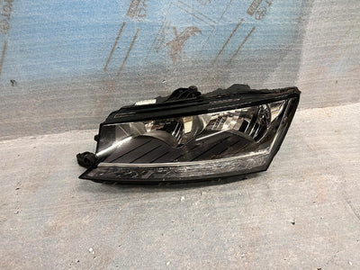 REFLEKTOR LEWY SKODA FABUA III LIFT nr.0