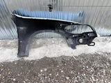 BŁOTNIK PRZEDNI LEWY BMW X5 E70 USA nr.000
