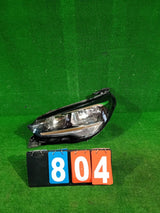 REFLEKTOR LEWY PRZÓD OPEL CORSA F 20- ZWYKŁA NR.804