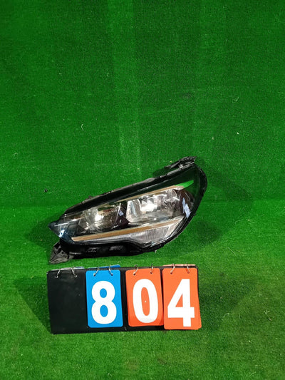 REFLEKTOR LEWY PRZÓD OPEL CORSA F 20- ZWYKŁA NR.804