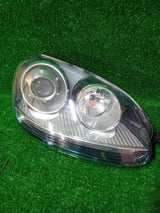 REFLEKTOR PRAWY VW GOLF V JETTA XENON 1K6941032